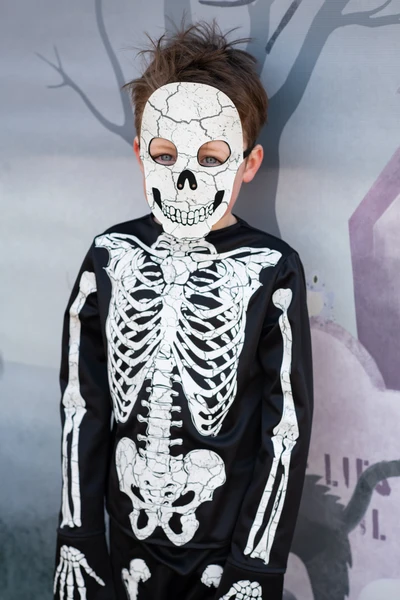 Child wearing Glow in the Dark Skeleton Shirt, Pants & Mask