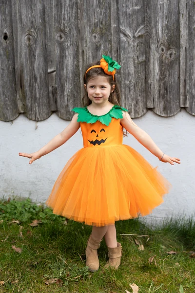 Child wearing Pumpkin Patch Princess Dress